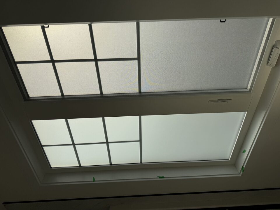 Close view of Silver Tech frosted privacy film across the sash of a Legacy, SE Calgary bathroom window