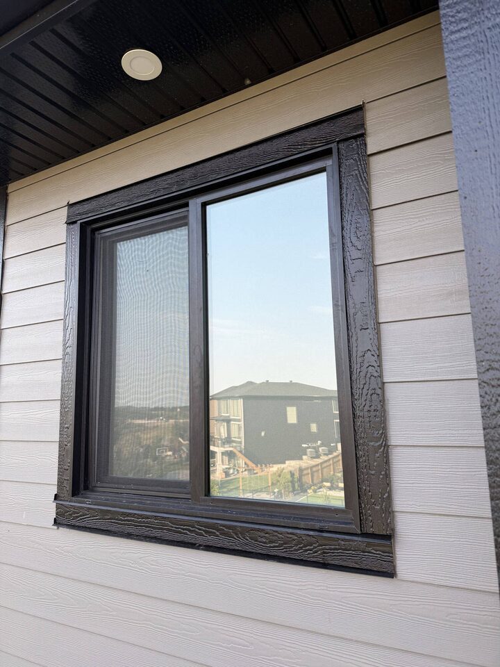 Exterior window of the Legacy, SE Calgary home from the Silver Tech privacy film project