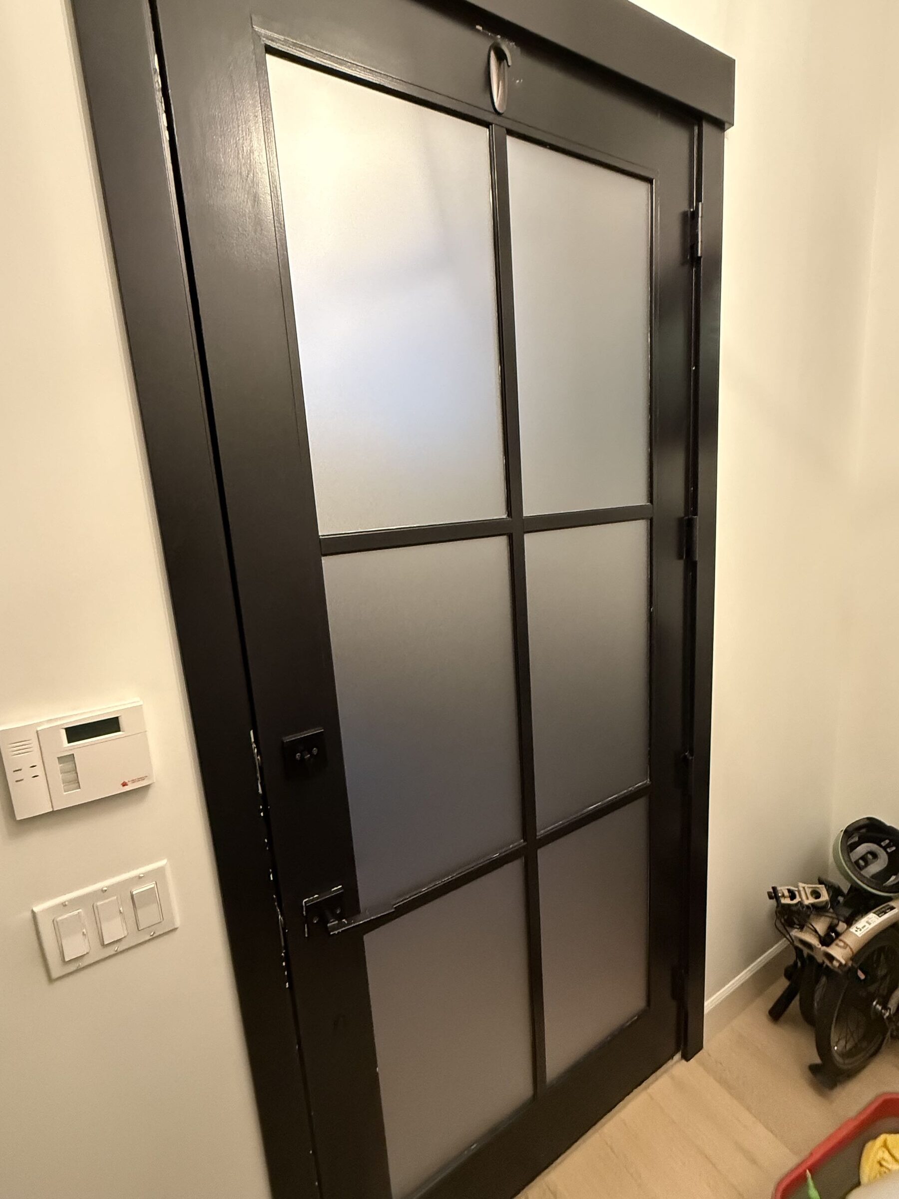 Inside view of the Altadore front door after Metamark Dusted Crystal frosted film, all six panels evenly frosted in daylight