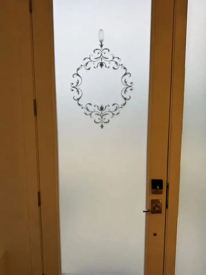 Metamark Silver Etch frosted privacy window film replacement on a front entry door in Capitol Hill NW Calgary