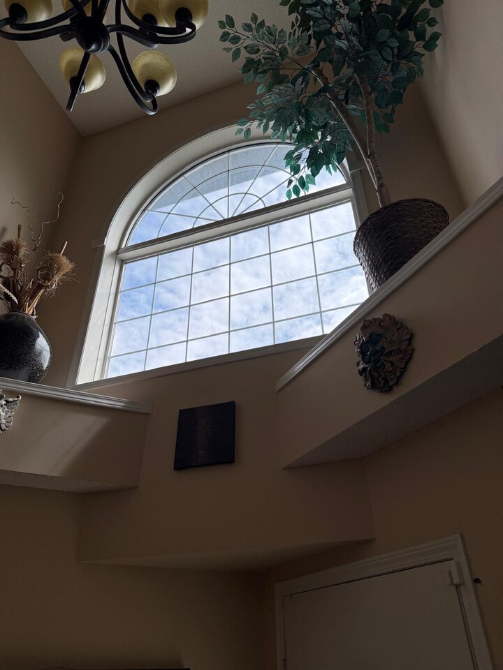 Solar Film Replacement – Arched Foyer Window - Douglasdale, SE Calgary, AB