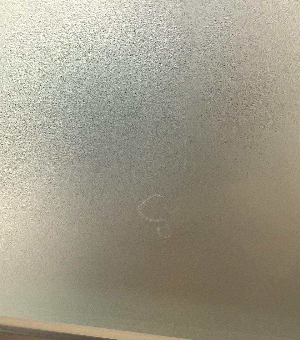 A film defect visible in frosted privacy film