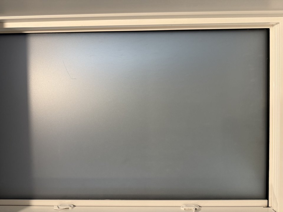 A frosted film window seen from about two metres, the standard inspection distance