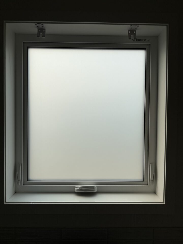 Ensuite window fully frosted with Silver Tech privacy window film in a new-build Mahogany SE Calgary home
