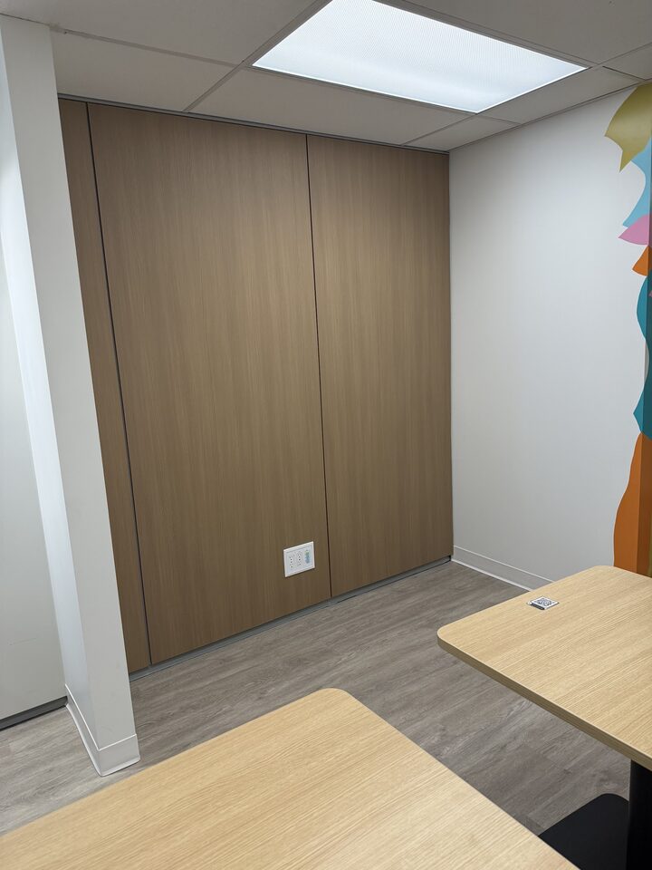 3M DI-NOC wood-grain architectural film installed at a Beltline office in Calgary