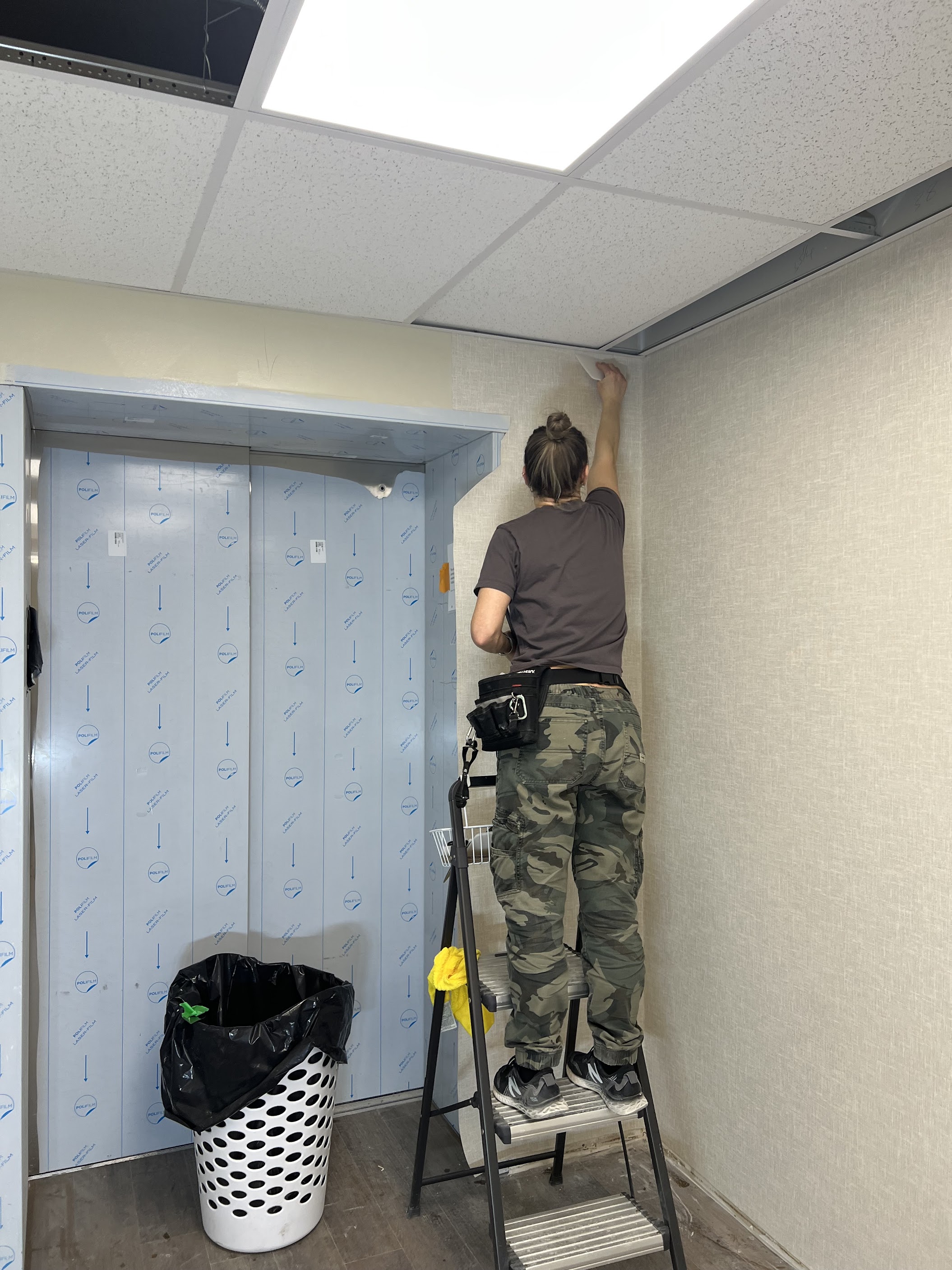 Commercial wallcovering installation at a Chestermere senior living community