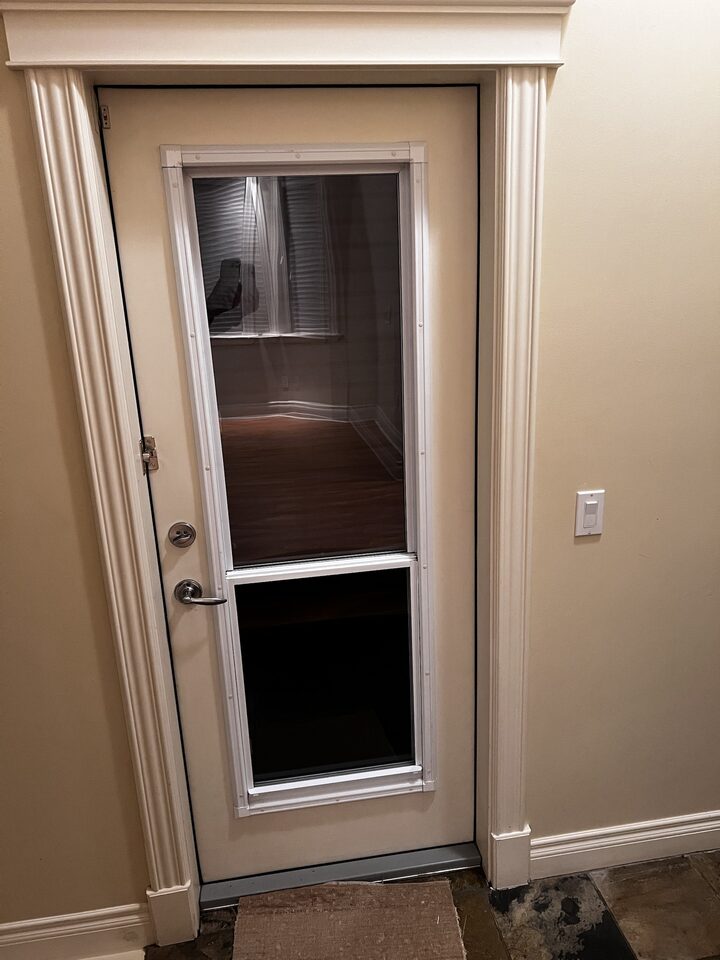 Vented-glass mudroom door with clear security window film on both panes in South Calgary, SW Calgary