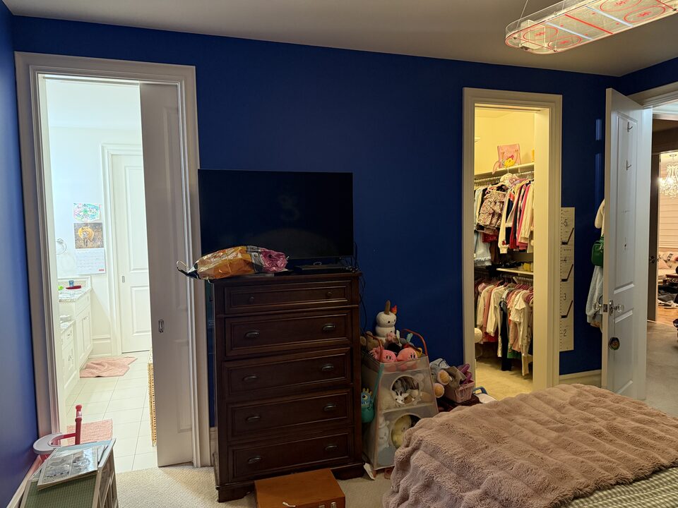 Kids bedroom closet and dresser wall before the wallpaper accent wall installation, Springbank, Rocky View County