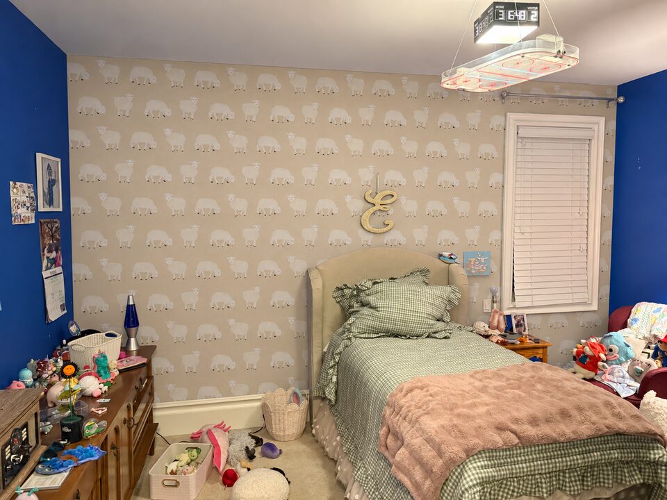 Rendering of the sheep-print wallpaper installed on the bed wall of a kids bedroom in Springbank, Rocky View County (design visualization, not a photograph)
