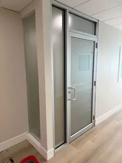 Case study for Dusted Crystal frosted privacy window film on office glass doors and sidelites in Vista Heights, NE Calgary.