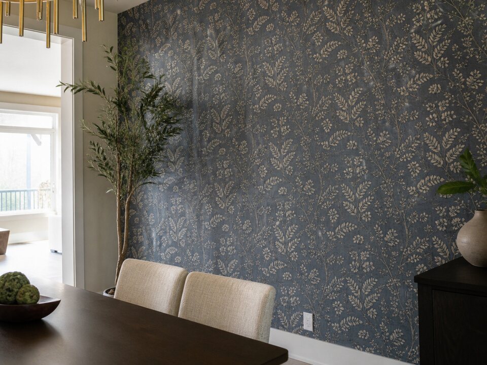 Patterned wallpaper installation detail for a finished Calgary feature wall