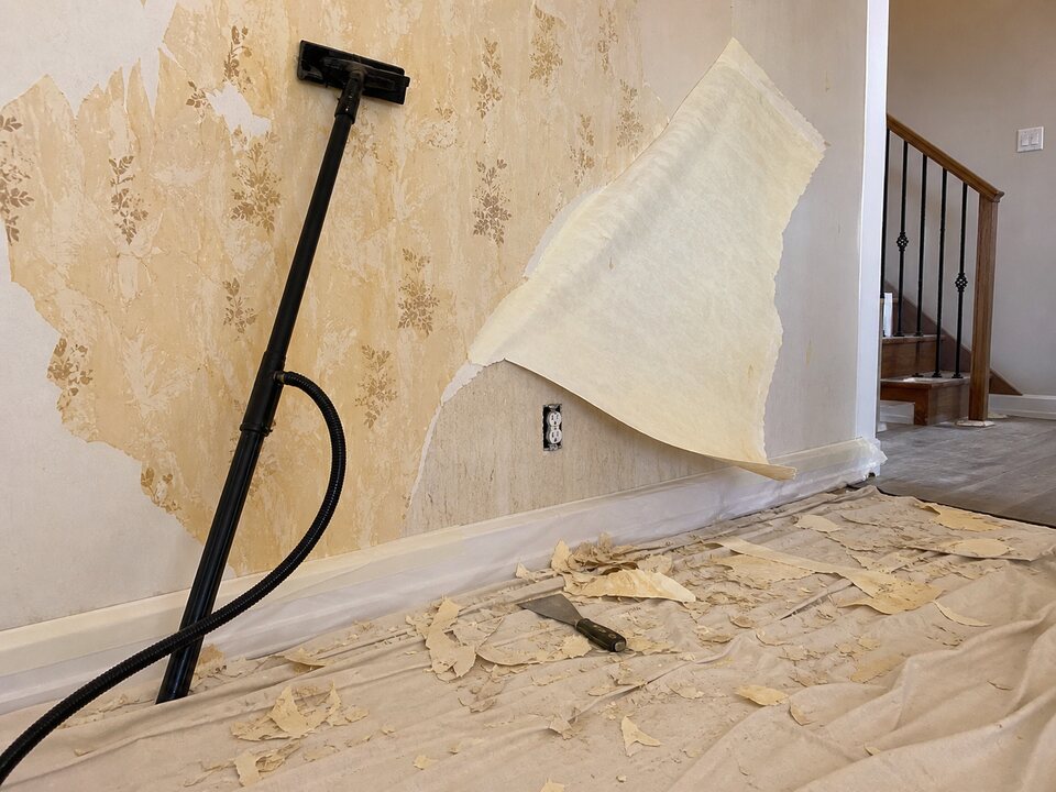 Professional wallpaper removal and stripping in a Calgary home
