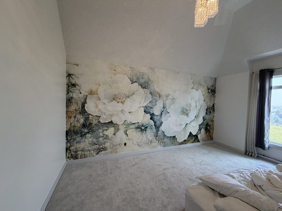 Bedroom with peony mural wallpaper feature wall, vaulted ceiling and chandelier in Winston Heights, NE Calgary